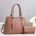 Detail of dark pink crocodile embossed handbag set with matching wallet and gold hardware - Dusty Pink