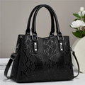 Borsa a mano nera alla moda in finta pelle con motivo a serpente e dettagli in metallo argento - Nero