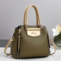 Elegant champagne gold Boston bag with geometric pattern and metal circular handle - Gold