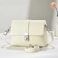 Detail of cream lychee texture leather small square bag with silver metal buckle closure - Off-white