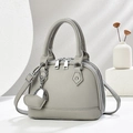 Light gray lychee leather crossbody bag with dual zipper and heart pendant charm - Gray