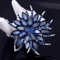 Floral crystal brooch with deep blue marquise stones on silver metal setting - Ink Blue