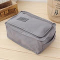 Portable gray nylon travel shoe bag with dual zippers and a durable top handle - Gray