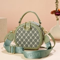 Chic Morandi green round crossbody bag with classic jacquard pattern and wide strap - Matcha Green