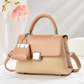 Elegant woven panel handbag in beige and tan leather with mini charm and silver hardware - Light Khaki