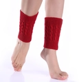 Detailed macro view of red cable knit boot cuffs showing thick wool texture and pattern - One Size / Red