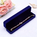 Elegante bracciale dorato con ciondolo a stella e strass rosa in scatola di velluto blu - Portagioie / Scatola per braccialetti blu notte