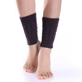 Macro detail of charcoal grey cable knit texture on women's winter leg warmers - One Size / Dark Gray