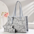 Light blue floral three-piece bag set with tote, wallet, and card holder in faux leather - Gray