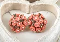 Coral pink floral stud earrings with champagne rhinestones in a white velvet box - Orange Red Flower Ball