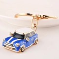 Mini car keychain in blue and white enamel finish with sparkling crystal accents - Chy-2102 / Dark Blue