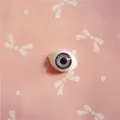 Detailed blue-grey realistic doll eyeball with fine iris texture and dark pupil - Dark Gray