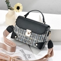 Contrast tweed and leather shoulder bag with gold turn-lock and patterned wide strap - Black