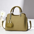 Detail of olive green woven texture shoulder bag with mini coin purse and silver chain - Green