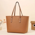 Brown large capacity pebble leather tote bag with silver rivets and minimalist design - Earthy Yellow