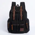 Mochila retro de lona negra con correas de cuero marrón y hebillas metálicas - Negro