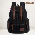Retro black canvas backpack with brown leather straps and metal buckle details - Black