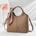 Elegant brown woven tote bag with silk scarf accent and versatile crossbody strap - Dark Khaki