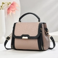 Elegant dusty pink woven tote bag with black leather handles and gold metal hardware - Khaki