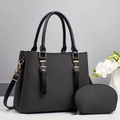 Deep grey textured two-piece tote bag set with matching small zipper pouch and gold hardware - Black