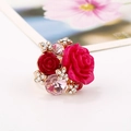 Adjustable gold ring with resin roses and pink crystals in magenta and dark red - Pink