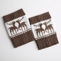 Detail of winter knitted leg warmers featuring Nordic reindeer pattern and ribbed cuffs - Vintage Khaki/White