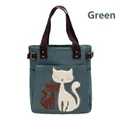 Green canvas tote bag with cat pattern embroidery and brown woven handles - Light Green