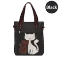 Black canvas tote bag with fuzzy cat patch embroidery and brown handles - Black