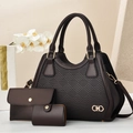 Detail of coffee brown three-piece handbag set featuring woven texture and gold metal logo - Coffee