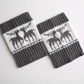 Close-up of dark grey knit leg warmers with white reindeer pattern and ribbed cuffs - Medium Grey/White