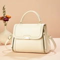 Chic beige tote bag with gold hardware and adjustable strap for women's daily commute - Off White