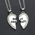 Silver split heart Best Friends necklace set with rhinestones on a dark background - 1336 Silver Inlaid Rhinestone Heart Style