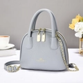 Litchi pattern leather shell bag in light blue-grey with golden hardware and chain strap - Blue