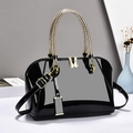 Bolso de mano de charol negro con asas doradas y correa de hombro ajustable para mujer - Negro