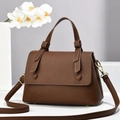 Stylish brown pebble leather saddle bag with gold hardware and top handle for women - Coffee