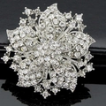Elegant silver flower brooch pin for women inlaid with sparkling crystal rhinestones - White