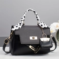 Elegant black leather handbag with grey textured flap and silk scarf handle detail - Black