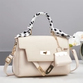 Detail of cream crossbody bag with woven texture flap, golden lock, and polka dot scarf - Off-white