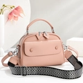 Pink pebbled leather top handle bag with wide chevron strap and silver hardware - Pink