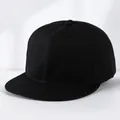 Detailed close-up of a plain black flat brim hip-hop cap with twill cotton texture - Adjustable / Black