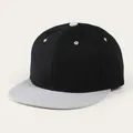 Detail view of a black cotton twill baseball cap featuring a flat white brim and top button - Adjustable / Black with White Brim