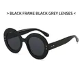 Gafas de sol ovaladas de gran tamaño con montura negra brillante y lentes grises UV - Montura Negra Lentes Gris Negro