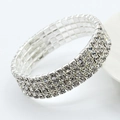 Luxurious multi-row stretch bracelet with silver-tone metal and sparkling white crystals - Quad Row (1327)