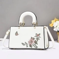 White leather handbag with floral embroidery and gold hardware for women - White