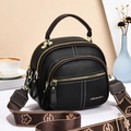 Minimalist black lychee leather crossbody bag with three zipper layers and gold hardware - Black