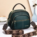 Dark green litchi leather shoulder bag with wide jacquard strap and gold hardware - Green