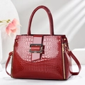 Luxurious dark red crocodile embossed patent leather handbag with gold-tone hardware detail - 32x13x24cm / Wine Red