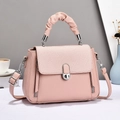 Pastel pink macaron-style handbag with woven flap and textured ruched handle - Pink