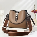 Fashionable camel leather bucket bag with gunmetal twist lock and wide woven shoulder strap - Khaki