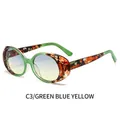 Occhiali da sole ovali tartarugati verdi con lenti sfumate blu-giallo dallo stile retrò - Montatura Tartarugata Verde / Lenti Blu Giallo